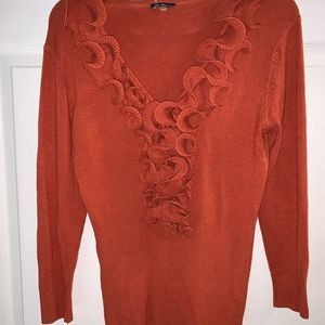 Orange ruffled up v-neck long sleeve blouse